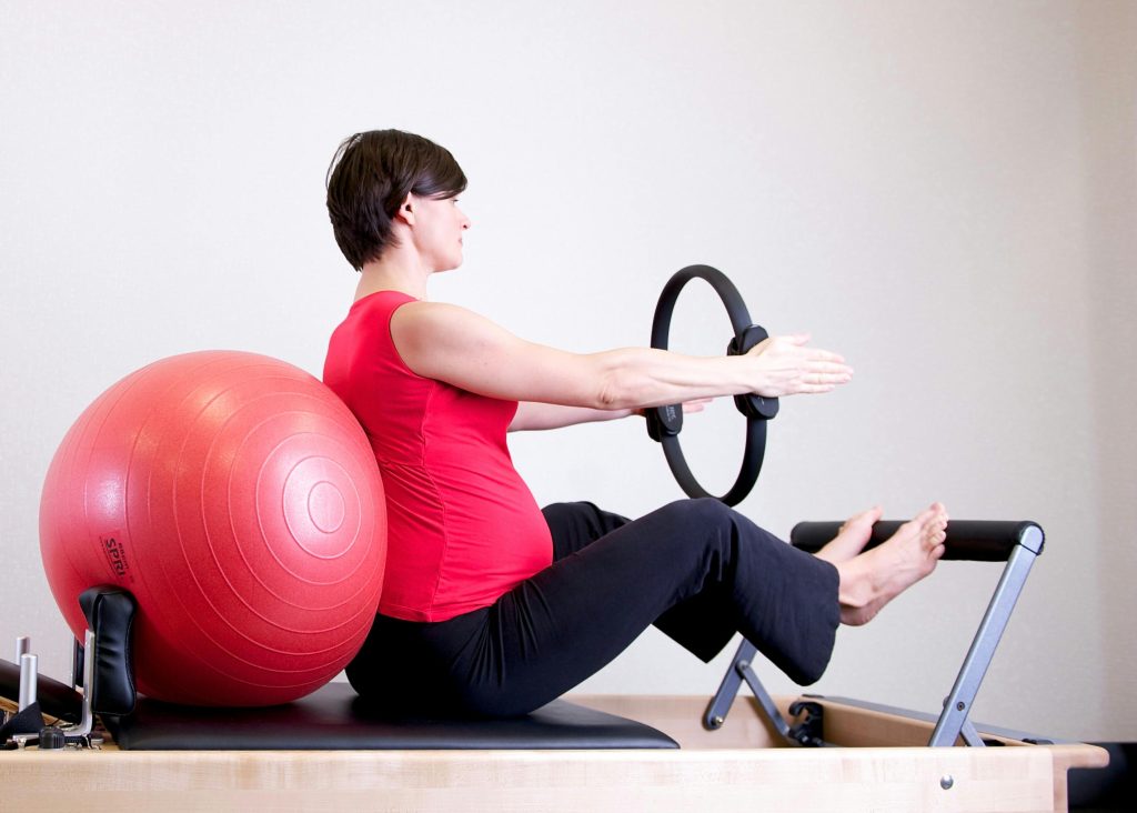 Pregnant women working out