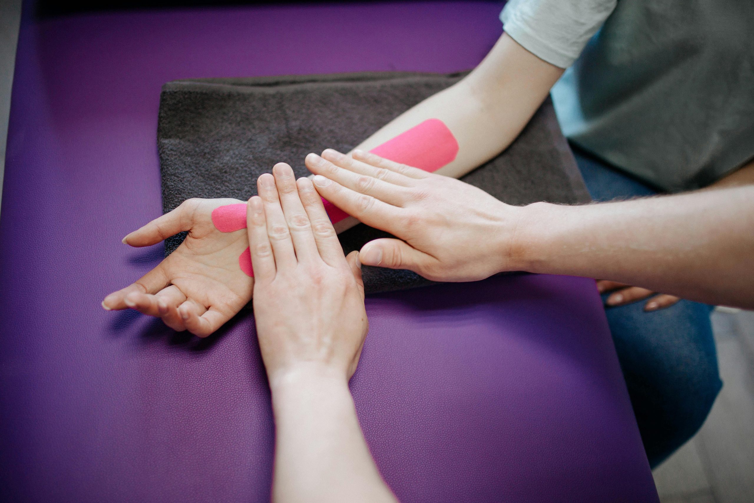 Person having their wrist taped